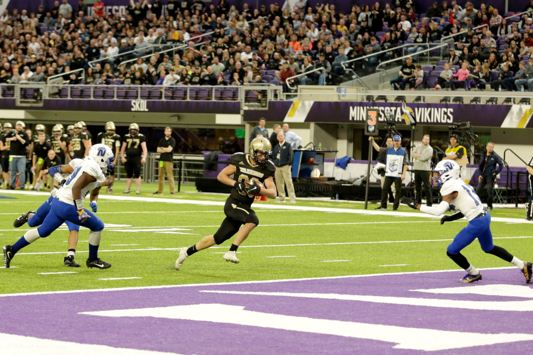 Cole Kronebusch goes in for a Warrior touchdown